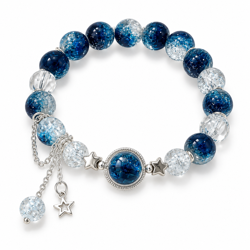 Starry Ocean Bracelet with blue and clear beads, silver-tone stars and dangling charms